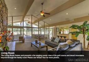 The Living Room frames and presents a far-ranging scenic view of the golf course and desert mountains beyond through the family room! Please see Virtual Tour for more photos.