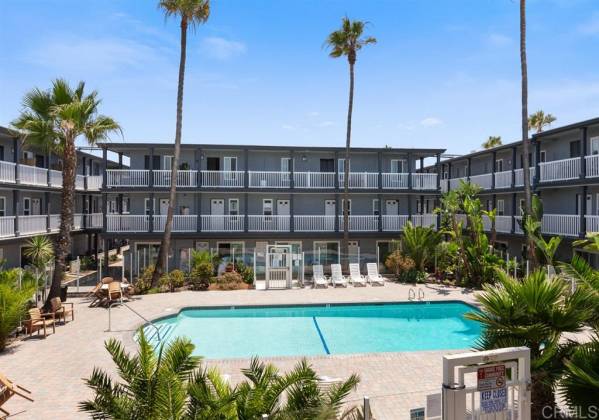 Enjoy the huge pool a few feet from your unit doorway.