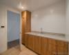 Full size Laundry room with Storage and Utility sink