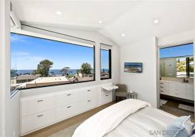 Featuring custom cabinets built in to the wall and a slide out writing desk.