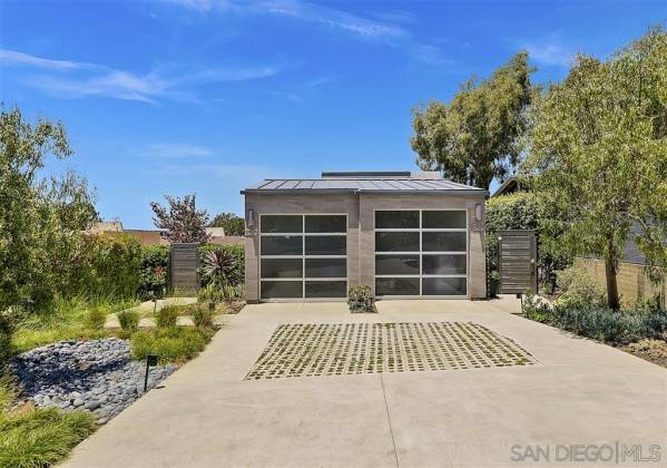 Ample parking. Each home has one designated bay plus two additional tandem parking spots in driveway.