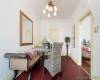 Formal dining room with door leading to attached granny flat