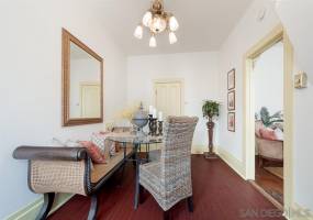 Formal dining room with door leading to attached granny flat