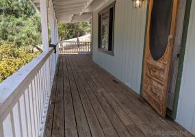 Covered porch on front of home.